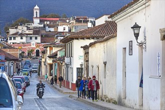 Tourists walking in street in the Mexican city San Cristobal de las Casas