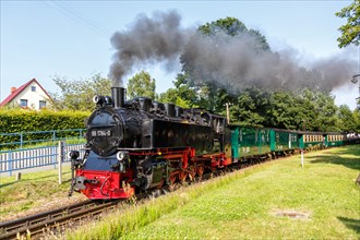 Steam train Rasender Roland railway steam locomotive on the island of Ruegen in Sellin