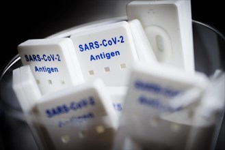 Negative SARS-CoV-2 Rapid Ag Antigen rapid tests are in a jar. Berlin
