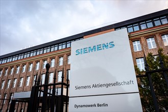 A Siemens company sign in front of a branch office in Siemensstadt in Berlin
