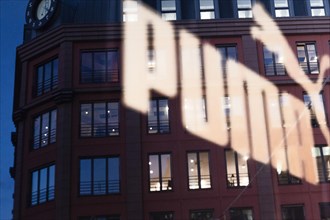 The logo of the sporting goods manufacturer PUMA in a branch in Berlin