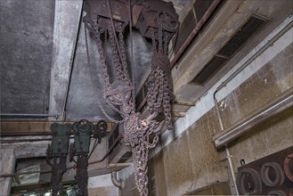 Chains from a pulley block of a former paper factory