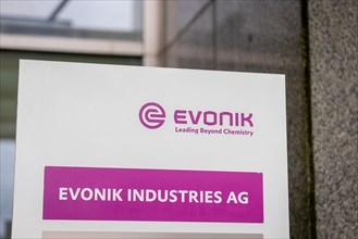 A sign of the evonik company at their headquarters in Essen