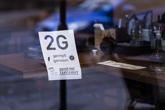 A sign for entry with the 2G rule