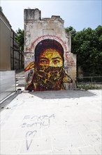 Mural of a hooded woman