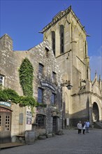 Old picturesque houses and the Saint Ronan church at Locronan