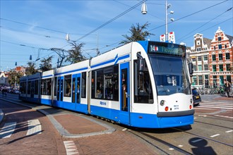 Siemens Combino Tram light rail tram local transport at the Rokin in Amsterdam