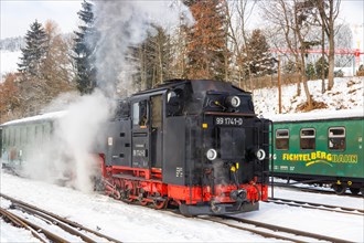 Fichtelbergbahn Railway steam train in winter in Oberwiesenthal