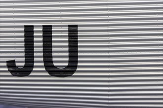 Detail of a Junkers aluminium aircraft with large letters JU