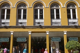 Mustard-coloured house front