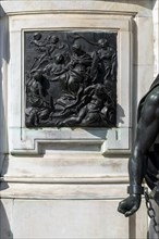 Detail photo of the chained warriors at the base of the equestrian statue of Frederick William of Brandenburg