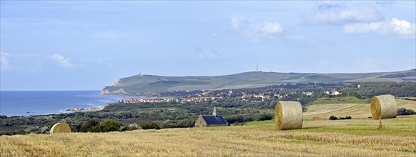 Mowed field with view over the village Escalles and Cap Blanc Nez with obelisk of the Dover Patrol Memorial