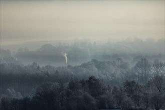 Smoke is visible from the chimneys on an icy morning in Koenigshain