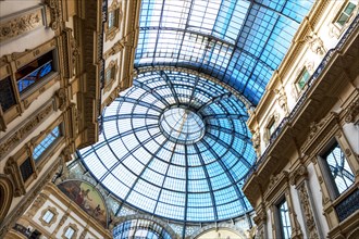Glass dome roof and frescoes in the Galleria Vittorio Emanuele II