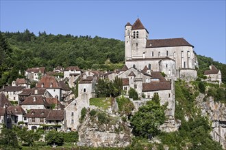 View over houses and the fortified church of the medieval village Saint-Cirq-Lapopie