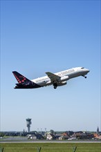 Sukhoi Superjet 100-95B from Brussels Airlines taking off from runway at the Brussels-National airport