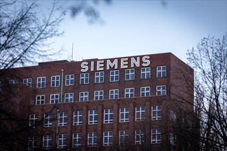 A lettering of the Siemens company on a branch in the Siemensstadt in Berlin