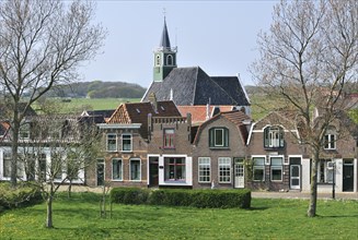 The Sailor church and traditional houses in the village Oudeschild