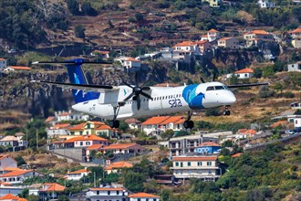 A De Havilland Canada Dash 8 Q400 aircraft of Sata Air Acores with registration CS-TRG at Madeira Airport