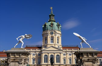 Statue of naked warriors in front of the main entrance to Charlottenburg Palace