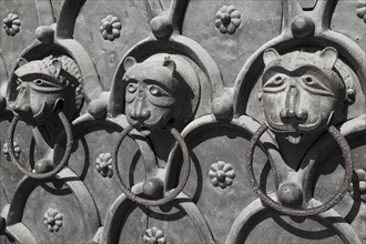 Bronze lion heads on the main portal of St Mark's Basilica