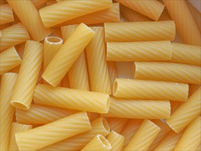 Tortiglioni pasta food background