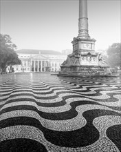 Black and white photograph of the Praca Dom Pedro with the famous wave pattern in Lisbon