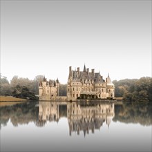 Long exposure with reflection in the lake of Chateau de la Bretesche near Nantes