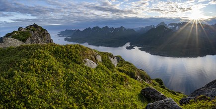 View of Fjord Raftsund and mountains in the evening light