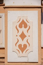 Cartouche with graphic patterns on a historic architecture in the city centre of Bad Frankenhausen