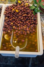 Turkish style prepared olives in the market stands