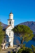 Church of Saints Fedele and Simone and Lake Lugano with Mountain in a Sunny Day in Vico Morcote