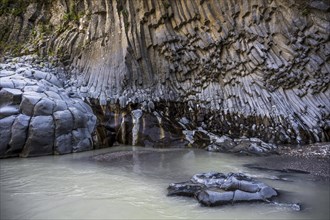 Rock formations of basalt and lava rock in the river park Gole dell' Alcantara