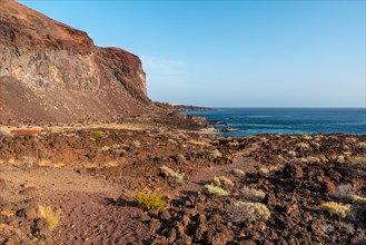 Volcanic path on the beach of Tacoron in El Hierro to go down to the recreational area