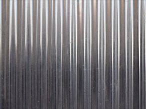Grey corrugated steel texture background