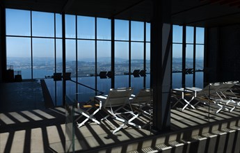 Infinity Swimming Pool with Window View over City and Lake Lucerne in Sunny Day in Lucerne