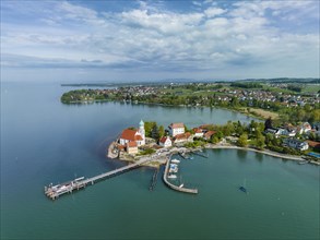 Aerial view of the moated castle peninsula on Lake Constance with the baroque church of St. George