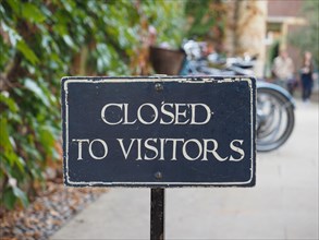 Closed to visitors sign selective focus