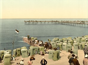 The pier of Norderney with the beach of the North Sea
