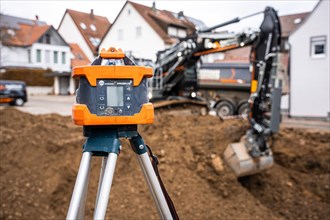 Survey equipment for excavated earth on construction site