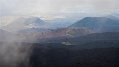 Fog and volcanic landscape of Etna