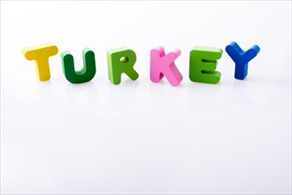 The word TURKEY written with colorful letter blocks