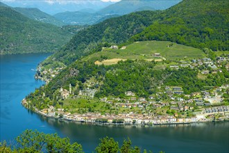 Aerial View over Morcote with Alpine Lake Lugano and Mountain in a Sunny Day in Ticino