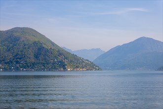 Alpine Lake Lugano with Mountain in a Sunny Day in Morcote