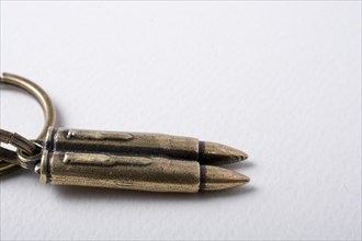 Bullet on white background as against the war conceptual photography