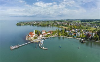 Aerial view of the moated castle peninsula on Lake Constance with the baroque church of St. George