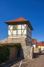 Historic half-timbered tower on the old town wall in Schachtweg