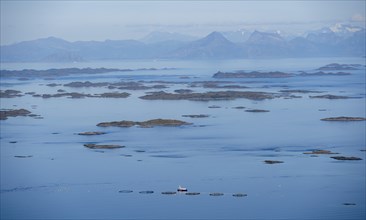 View of sea with archipelago islands from Svellingsflaket and mountains