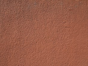 Brown red plaster wall background