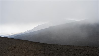 Fog and volcanic landscape of Etna